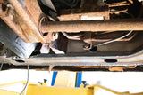 Close-up side view of Rust Buster Front Frame Repair Kit For 2000-2006 GM SUV's RB7406 installed to the frame rail