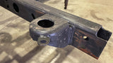 Side view of Rust Buster Rear Body Frame Mount For 2000-2014 GM SUVs RB7416 installed to the frame rail