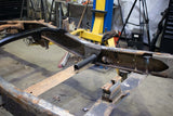 Wide angle, side view of the Rust Buster Diesel Fuel Cooler Bracket For 2001-2010 GM Pickups RB7819 installed to the frame rail