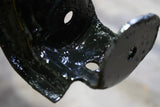 Close up look at Rust Buster Rust Converter & Primer Spray Paint RB9917 sprayed on a component attached to the frame rail.