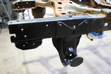 Zoomed out look at a piece of the frame rail that has been treated using Rust Buster Rust Converter & Primer Spray Paint RB9917