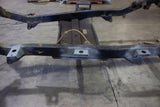 Three of the Rust Buster Body Mount Brackets For 1987-1995 Jeep Wrangler RB2016 installed to the frame rail