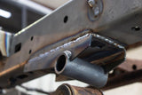 Side view of Rust Buster Rear Leaf Spring Shackle Mount For 1995-2004 Toyota Tacoma RB7101 installed to the frame rail