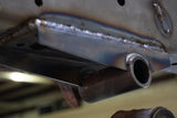 Close-up view of Rust Buster Rear Leaf Spring Shackle Mount For 1995-2004 Toyota Tacoma RB7101 installed to the frame rail