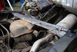 Side view of Rust Buster Fuel Tank Crossmember For 1995-2004 Toyota Tacoma RB7117 installed to the frame