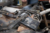 Rust Buster Fuel Tank Crossmember For 1995-2004 Toyota Tacoma RB7117 installed to the frame, as seen from the rear left side of the vehicle