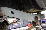 Side view of the Rust Buster Shackle Mount Frame Repair Kit For 1987-1995 Jeep Wrangler RB2002 installed to the vehicle