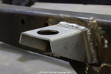Side view of one Rust Buster Body Mount Bracket For 1997-2006 Jeep Wrangler RB4018 installed to the frame rail