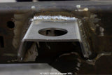 Frontal view of one Rust Buster Body Mount Bracket For 1997-2006 Jeep Wrangler RB4018 installed to the frame rail