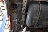 View looking up at one Rust Buster Center Unibody Stiffener For 1984-2001 Jeep Cherokee RB6061, installed to the frame rail