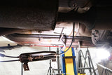 View from beneath one Rust Buster Center Unibody Stiffener For 1984-2001 Jeep Cherokee RB6061, installed to the frame rail