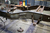 Side view of the Rust Buster Leaf Spring Frame Repair Kit For 1997-2003 Ford F-150 RB7003 installed to the frame rail
