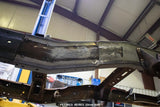 View from beneath the Rust Buster Leaf Spring Frame Repair Kit For 1997-2003 Ford F-150 RB7003 installed to the frame rail