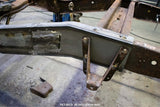 Overhead shot of the Rust Buster Leaf Spring Frame Repair Kit For 1997-2003 Ford F-150 RB7003 installed to the frame rail