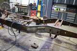 Overhead shot of the Rust Buster Leaf Spring Frame Repair Kit For 1997-2003 Ford F-150 RB7003 installed to the frame rail