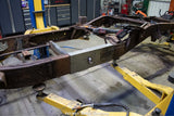 Wide angle, side view, of the Rust Buster Center Frame Repair Kit For 1997-2003 Ford F-150 RB7004 installed to the frame rail