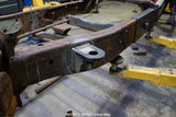 Side view of the Rust Buster Front Cab Mount For 1997-2003 Ford F-150 RB7007 installed to the frame rail
