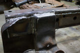 Close-up shot of the Rust Buster Rear Frame Repair Kit For 2009-2014 Ford F-150 RB7012 installed to the frame rail