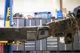 Wide view of the Rust Buster Front Frame Repair Kit For 2009-2014 Ford F-150 RB7017 installed to the frame rail