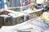 Side view of the Rust Buster Center Cab Mount For 2009-2014 Ford F-150 RB7020 installed to the frame rail
