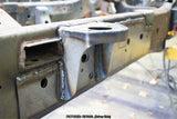 Close-up, side view of the Rust Buster Center Cab Mount For 2009-2014 Ford F-150 RB7020 installed to the frame rail