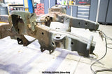 Wide angle of the Rust Buster Core Support Mount For 2009-2014 Ford F-150 RB7022 installed to the frame rail