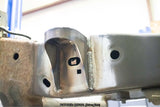 View from beneath the Rust Buster Core Support Mount For 2009-2014 Ford F-150 RB7022 installed to the frame rail