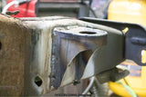 Side view of the Rust Buster Core Support Mount For 2009-2014 Ford F-150 RB7022 installed to the frame rail