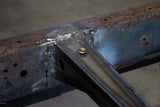 Close up view of Rust Buster Forward Fuel Tank Crossmember For 1995-2004 Toyota Tacoma RB7125 welded to the frame rail