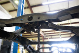 View from beneath Rust Buster Spare Tire Crossmember For 2005-2015 Toyota Tacoma RB7131 installed to the frame rail