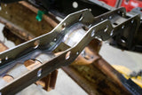 Side view of Rust Buster Forward Fuel Tank Crossmember For 2005-2015 Toyota Tacoma RB7133 bolted to the frame rails