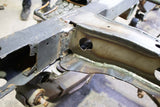Close-up shot of Rust Buster Spare Tire Crossmember For 1988-1995 Toyota Pickups RB7139 welded to one of the frame rails