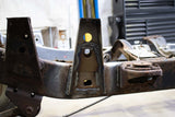 Rust Buster Middle Raised Bed Mount For 1988-1995 Toyota Hilux/Pickups RB7145 installed to the frame rail