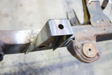 View from above Rust Buster Middle Raised Bed Mount For 1988-1995 Toyota Hilux/Pickups RB7145 installed to the frame rail