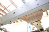 View from beneath Rust Buster Center Frame Repair Kit For 1999-2006 GM Pickups RB7313 installed to the frame rail