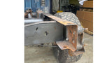 Close-up shot of Rust Buster Rear Frame Crossmember For 1999-2013 GM Pickups RB7331, welded to the right side of the vehicle's frame