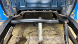 Rust Buster Fuel Tank Crossmember For 2007-2013 GM Pickups RB7340 installed to the frame, as seen from the rear of the vehicle