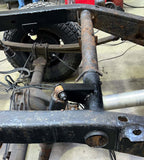 Wide angle of Rust Buster Rear Upper Shock Mount For 2007-2013 GM Pickups RB7343 installed to the frame