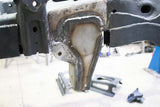 Close up view of Rust Buster Rear Track Bar Bracket For 2000-2014 GM SUV's RB7407 installed to the frame rail