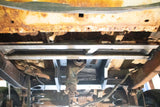 Straight-on view of Rust Buster Rear Spare Tire Crossmember For 2000-2006 GM SUV's RB7414 installed to the frame