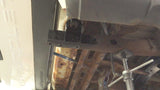 Additional view of Rust Buster Rear Body Frame Mount For 2000-2014 GM SUVs RB7416 from beneath the frame, with the body of a Chevy Avalanche reattached.