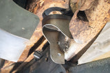 Side view of Rust Buster Center Rear Body Frame Mount For 2000-2014 GM SUV's RB7417 installed to the frame rail
