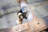 Side view of Rust Buster Rear Shock Mount For 2001-2010 GM Pickups RB7816 installed to the frame rail