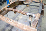Wide angle of Rust Buster Rear Shock Mount For 2001-2010 GM Pickups RB7816 installed to the frame rail