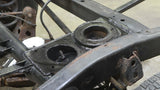 Opposing side view of Rust Buster Rear Upper Coil Spring Bucket For 1996-2002 Toyota 4Runner RB8418 installed to the frame 