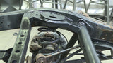 Side view of Rust Buster Rear Upper Coil Spring Bucket For FJ Cruiser/ 4Runner RB8426 installed to the frame