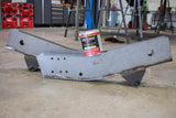 Total Protection Rust Cover Paint 1 US Quart - Satin Black RB9909 sitting atop of one Rust Buster Frame Repair Kit