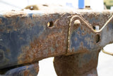 Close up look at a rusted frame rail