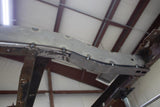 View from beneath one of the Rust Buster Rear Frame Stiffeners For 1976-1986 Jeep CJ RB1006 installed to the frame rail