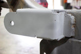 Opposing side view of Rust Buster Control Arm Mount For 1997-2006 Jeep Wrangler RB4021 installed to the frame rail